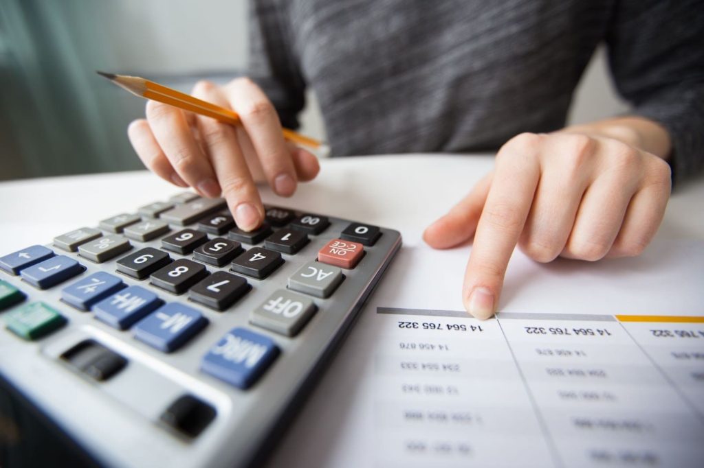 Girl using calculator