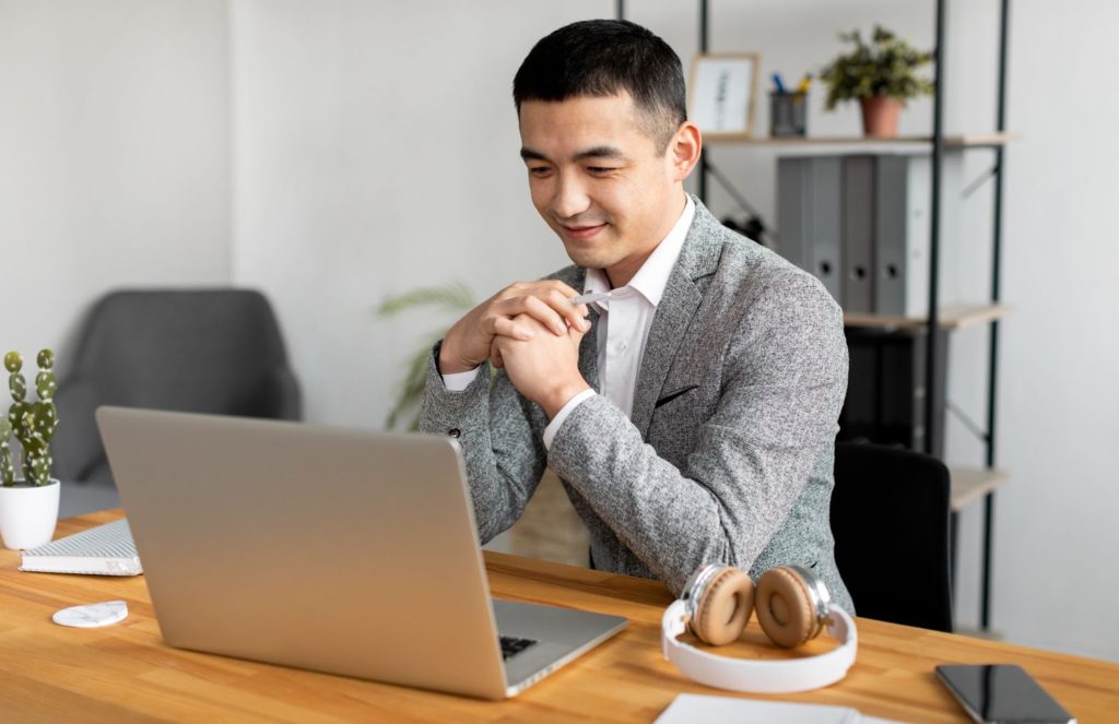 entrepreneur on his laptop registering